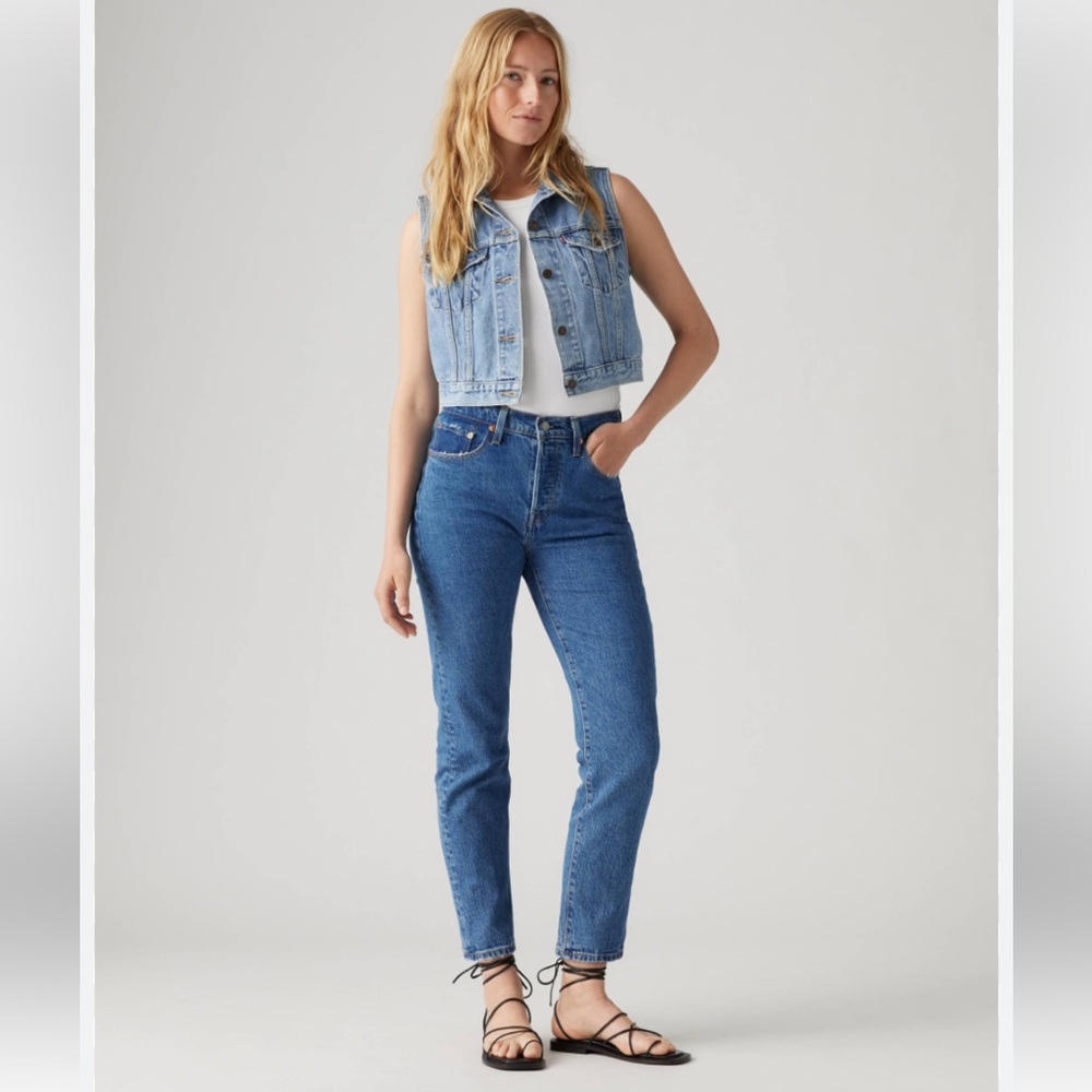 Levis 501 Distressed Raw Hem Jeans.